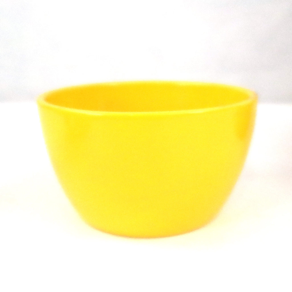 Ceramic Garden Bowl planter displayed on a white surface with a plain background, suitable for indoor or outdoor use. Available in 9 colors.