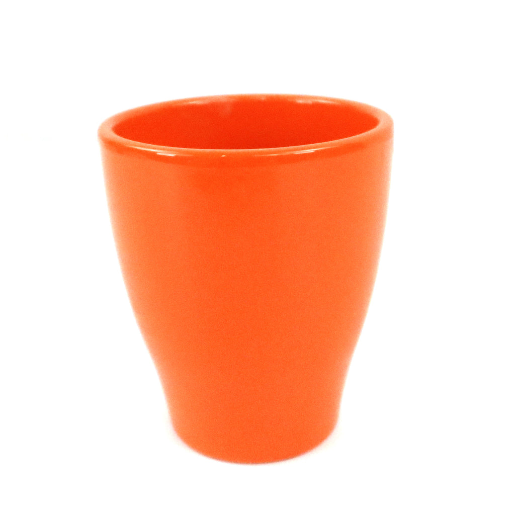 Bright orange ceramic glossy solid color pottery with a smooth finish is shown on a plain white background, highlighting its vibrant style.